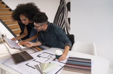 side-view-people-working-with-laptop